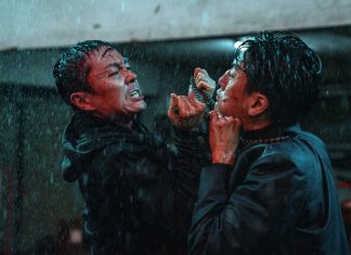 Two men fight in the rain in The Furious