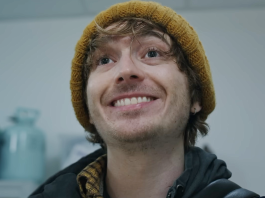 Bryan (Austin Abrams) smiles in the hospital in Resident Evil reboot