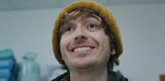 Zach Cregger’s ‘Resident Evil’ Reboot Looks Terrifying in First Trailer Bryan (Austin Abrams) smiles in the hospital in Resident Evil reboot