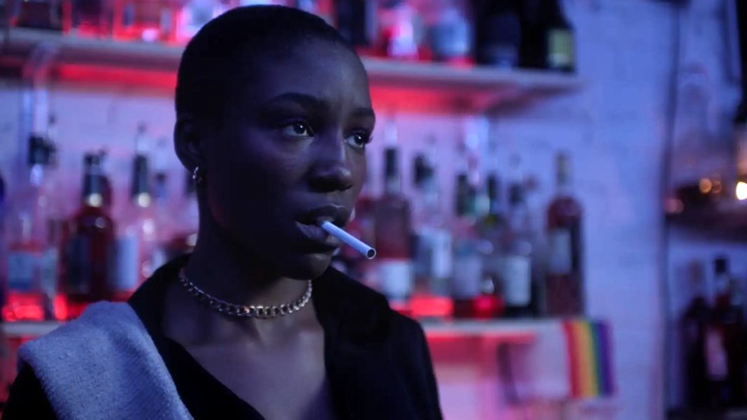Carol smokes in a bar in Son of Sara Volume 1