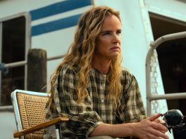 Crystal (Juliette Lewis) sits on the houseboat deck, fishing, in Cape Fear Episode 9