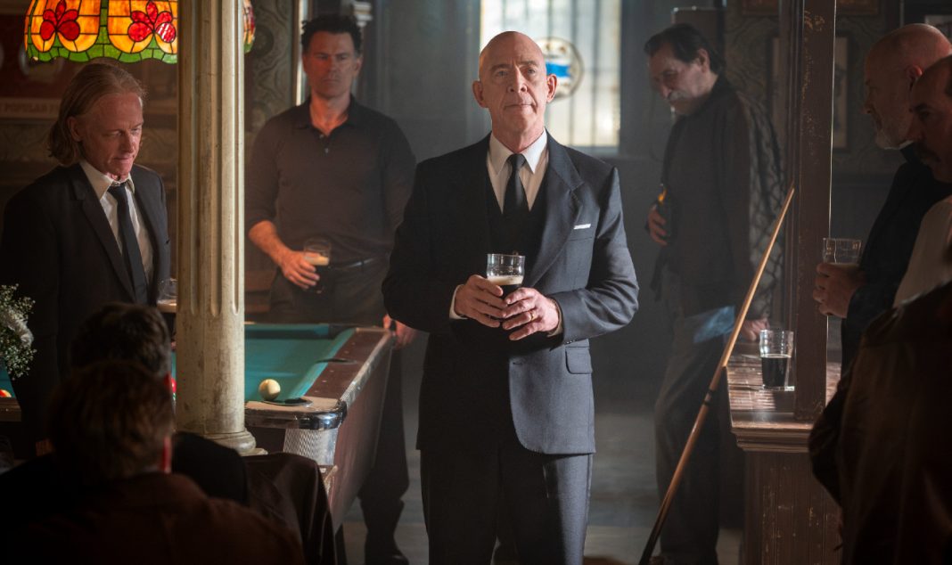 Eamon Sweeney (J.K. Simmons) gives a toast at a bar in The Westies Episode 4