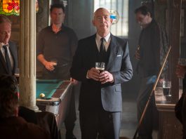 Eamon Sweeney (J.K. Simmons) gives a toast at a bar in The Westies Episode 4