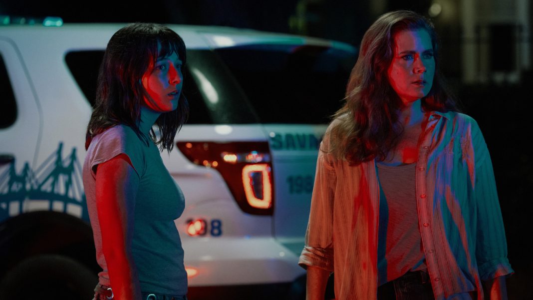 Natalie and Anna stand next to police cars in Cape Fear Episode 6