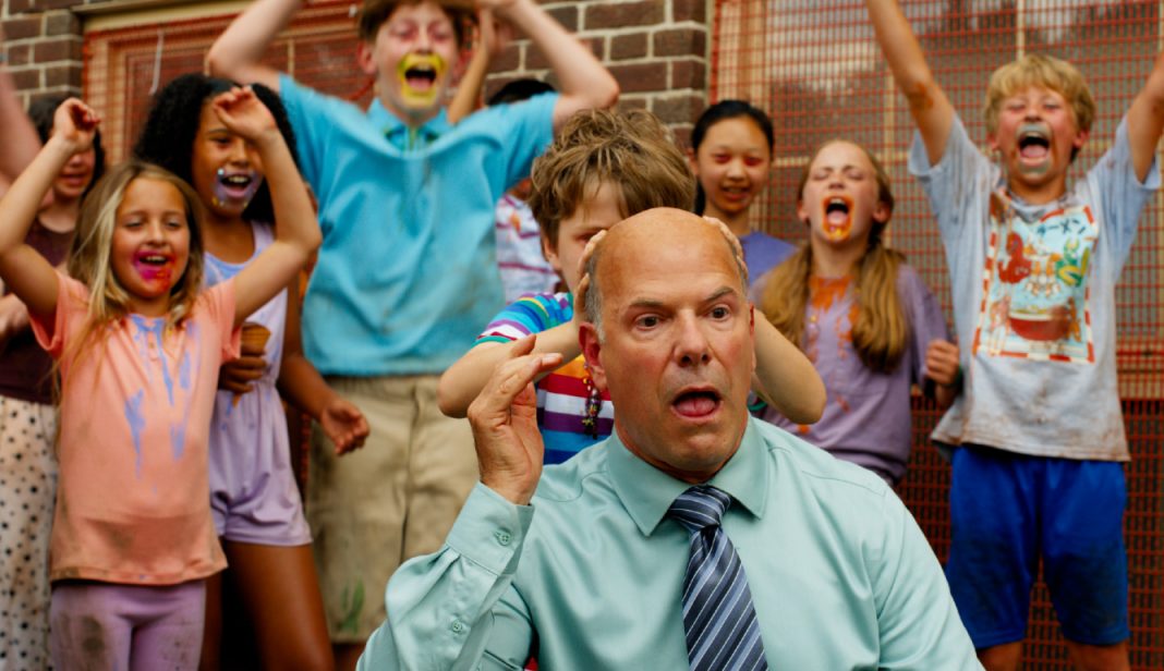 Children cheer while killing Principal Maloney (Darrin Baker) in Eli Roth's Ice Cream Man