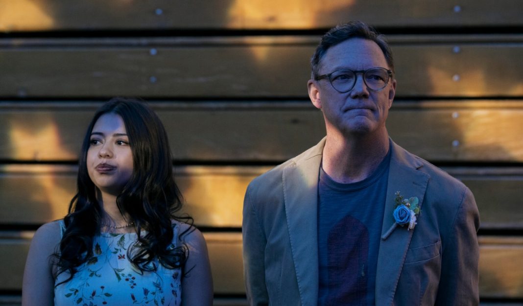 Matthew Lillard (Principal Henry Grayle) and Amber Midthunder (Ms. Rita Desjardin) chaperone a dance in Carrie Season 1